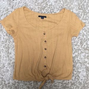 Yellow button down crop top